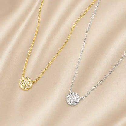 Colar ponto de luz em Prata de Lei 925 dourado e prateado com zircónias sobre tecido bege elegante